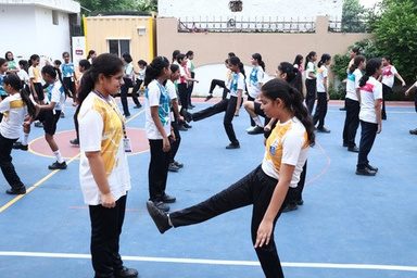 Participants during an energetic self-defense drill