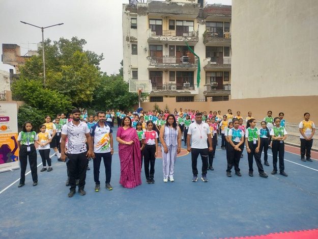 Girls practising self-defense at an AAKAAR workshop